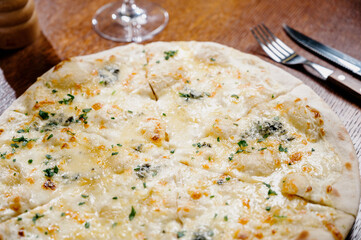 Flatbread with greens and herbs. Traditional caucasus and Turkish bread. Asian flatbreads with cheese and herbs