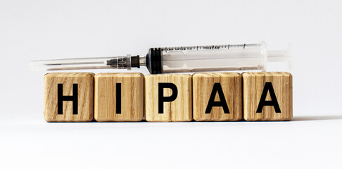 Text HIPAA made from wooden cubes. White background