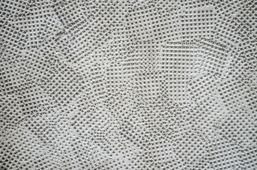 Gray plaster with artistic texture.