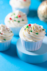 Homemade christmas cupcakes with different decorations. New year food concept.
