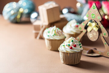 Homemade christmas cupcakes with different decorations. New year food concept.