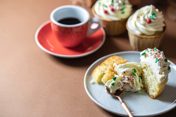 Homemade christmas cupcakes with different decorations. New year food concept.