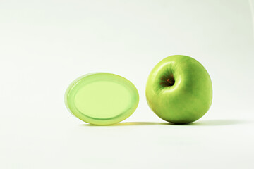 Handmade apple soap isolated on white background Taken along with green apples, Green apple glycerin soap.