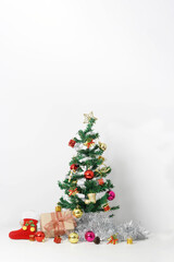 Christmas composition with decorations and gift box with bows on white background. winter, new year concept. Flat lay, top view, copy space.