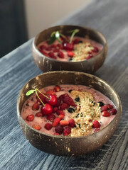 Fototapeta na wymiar Forest berries smoothie bowls for breakfast