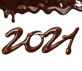 Date of the new year 2021 written by melted chocolate on a white background