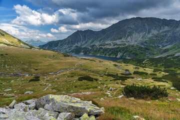 Fototapeta na wymiar Summer landscapes of the High Tatras Mountains with beautiful views of lakes and mountain houses