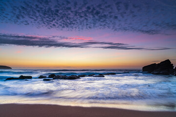 Naklejka na ściany i meble Beautiful sunrise with high cloud at the seaside