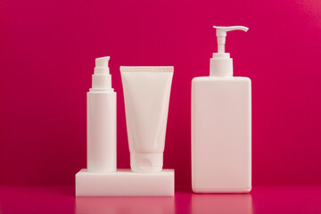 Set of cosmetic bottles with creams for face and body care