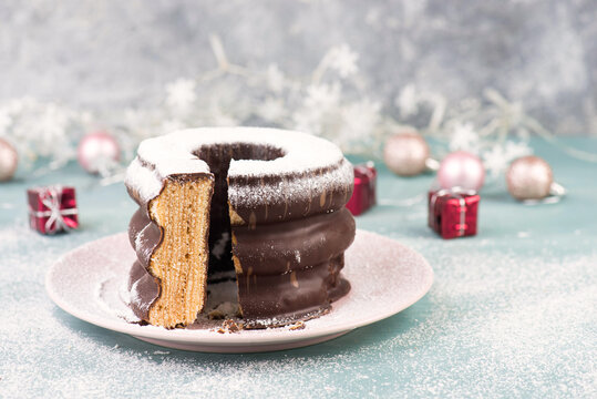 Traditional german christmas chocolate cake called Baumkuchen, winter season sweets