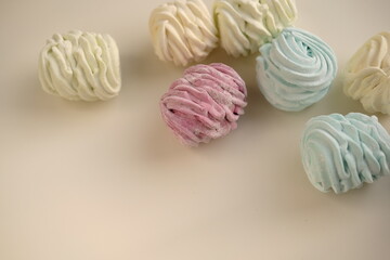 hand-made colored marshmallows on the surface. the special focus. place for text. confectionery
