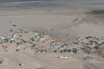 Wooden Fishing boats on the beach of Ras Madrakah in   Oman