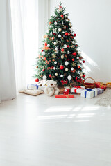 New year interior with Christmas tree with gifts decor garland December