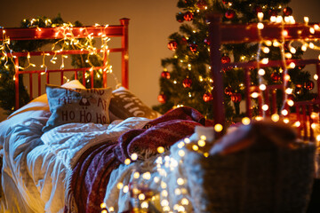 new year cozy home interior with christmas tree and garlands