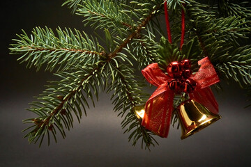 Christmas decoration with bells on a black background.