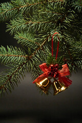 Christmas decoration with bells on a black background.