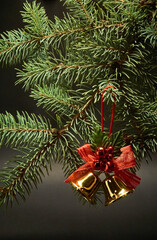 Christmas decoration with bells on a black background.