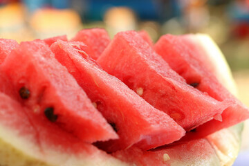 Close up photography of the divided into slices watermelon and melon.Outdoor picnic.Summertime concept.