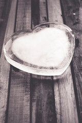 Black and white icy heart on stripes background