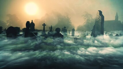 Spooky supernatural graveyard in the early morning with silhouette tombstone and fog.