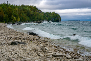 To the grotto, a natural wonder in Bruce Peninsula National Park. This park is protecting a rugged shore of the Lake Huron with turquoise blue waters