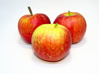 Three apples on white background.    