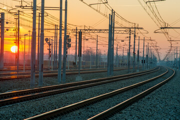 Fototapeta na wymiar train station at sunset