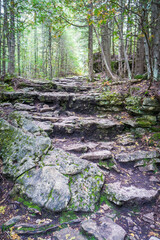 To the grotto, a natural wonder in Bruce Peninsula National Park. This park is protecting a rugged shore of the Lake Huron with turquoise blue waters