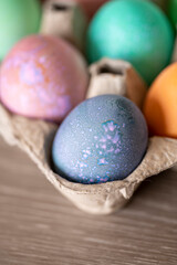 Obraz na płótnie Canvas Colorful Easter Eggs in Egg Carton