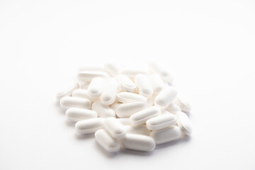Fototapeta na wymiar Macro photo of a bunch of little white zinc pills