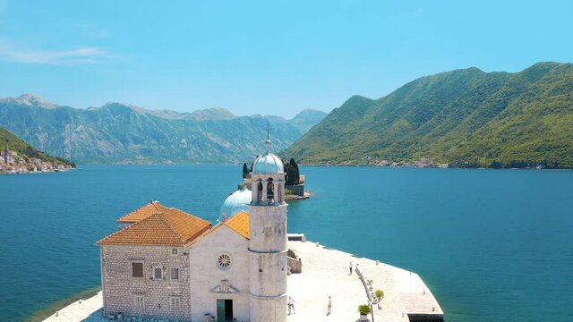 Perast, Bay of Kotor, Montenegro. Aerial view of the Our Lady of the Rocks. The island Saint George on the background