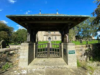 Entrance, to an old stone built church, in the village of, Rylstone, Skipton, UK
