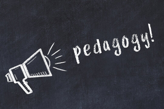 Chalk loudspeaker and inscription pedagogy on black chalkboard