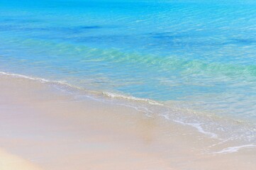 Fototapeta na wymiar Blue calm soft waves of Indian ocean paradise white sand tropical beach exotic Seychelles island, peaceful idyllic summer landscape for relax and meditation, Tranquil rippled sea, sunlight, seascape.