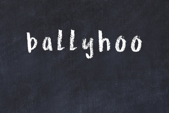 College chalk desk with the word ballyhoo written on in