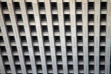 The regular windows pattern in a concrete building