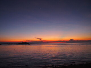 Fototapeta na wymiar Beautiful sunset with an amazing gradation of color in the sky, Malapascua Island, Daanbantayan, Philippines
