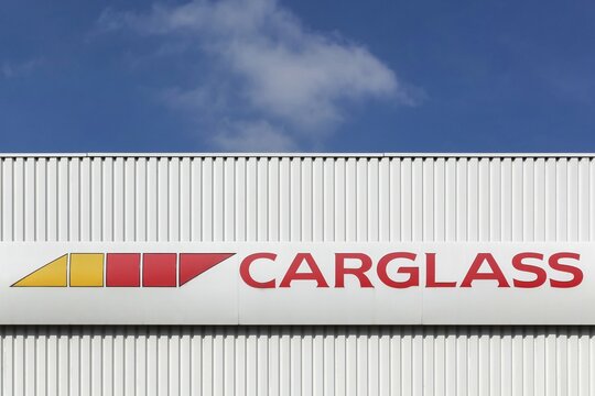 Villefranche, France - September 27, 2015: Carglass logo on a facade.  Carglass is a vehicle glass repair and replacement group operating worldwide across 35 countries