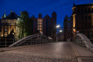 Fototapeta na wymiar Night in the historic warehouse district of Hamburg.