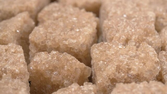 Sugar lumpy close-up. Brown sugar. Sugar cubes.