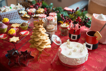 table set at home with a variety of Christmas products and food
