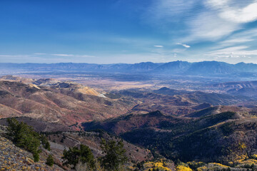 Fototapeta na wymiar Butterfield Peak views of Oquirrh range toward Provo, Tooele, Utah Lake and Salt Lake County by Rio Tinto Bingham Copper Mine, in fall. Utah. United States.