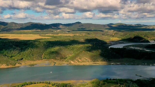 Aerial timelapse of natural landscape with Guadiana river, close to Herdade do Vau, Portugal.