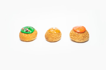 color profitroles isolated on the white background