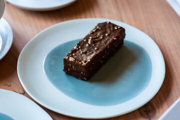 Delicious dessert in a blue plate in a cafe