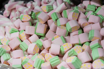 Assortment of colorful delicious marmalade jelly candies for sale on counter of shop, grocery, market, cafe. Dessert, sweet food and confectionery concept