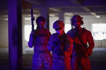 soldier squad team portrait in urban environment colored lightis