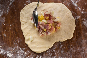 woman cooking traditional tatarian dish echpochmak © DAWT_PHOTO