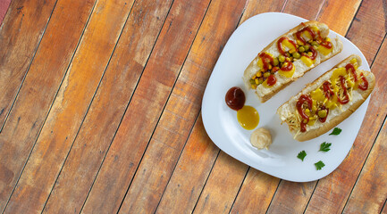Hot dog with yellow mustard, ketchup, peas and corn