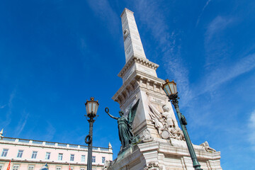 Fototapeta premium Famous Independence square, Lisbon (Praca de Restauradores) in historic city center